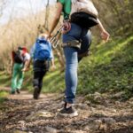 Young slim woman enjoys weight loss result